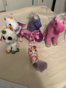 lot 110 image: Horse and unicorn toy lot