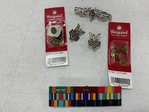lot 132 image: Military pins and such