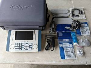 lot 22 image: Electro Medical WellnessPro 2010 PLUS - Powers on, Include items shown
