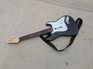 lot 29 image: Rockband Harmonix XBGTS2 Guitar Controller for XBOX 360