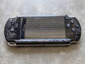 lot 99 image: Sony PSP-2001 PlayStation Portable System - Untested