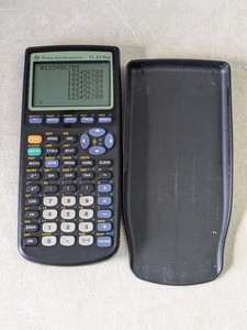 lot 140 image: Texas Instruments TI-83 Plus Graphing Calculator