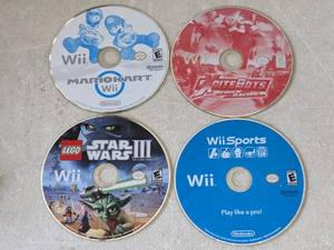 lot 166 image: Lot of 4 - Nintendo Wii Games