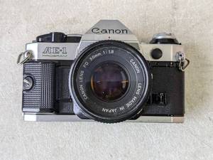 lot 212 image: Canon AE-1 35mm Film Camera w 50mm f1.8 Lens