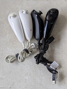 lot 248 image: Lot of 4 - Nintendo Wii Nun-Chuck Controller