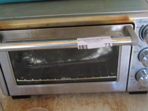 lot 73 image: Oster toaster oven needs cleaning