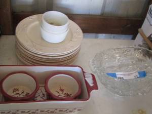 lot 71 image: Essential red ceramic baking dish- 2 flower shape rubber bowls- 3 sauce cups- 9 Mesa International saucers