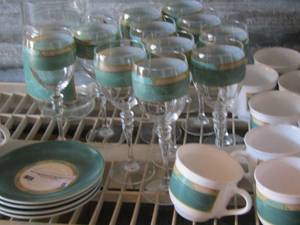 lot 8 image: 70s Arcopal Luminarc Cortina France dishes- 1 creamer- 13 handled coffee cups- 4 saucers- 11 short stem wine glasses- 1 handled drink pitcher