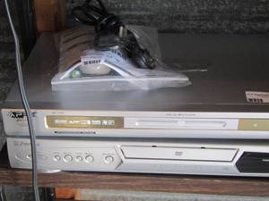 lot 11 image: Apex dvdcdmp3 player with remote---- Emerson dvd player