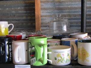 lot 88 image: large qty of coffee mugs cups- wine glasses and cake plate