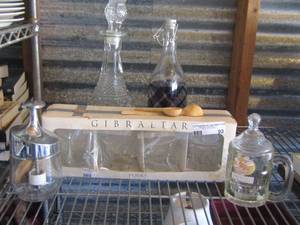 lot 93 image: 2 glass vinegar jars- hand chopper- dog mug- set of 4 bar glasses NIP