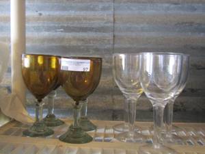 lot 97 image: 4 brown glass wine glasses- 5 clear plastic wine glasses