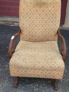 lot 14 image: Tan floral design antique rocking chair with a small stain easy to clean