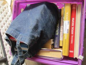 lot 140 image: purple tote of book lot all types of titles