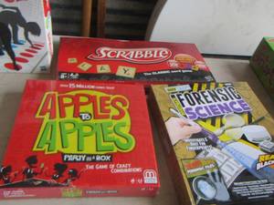 lot 37 image: game lot- twister- apples to apples- scrabble- forensics science