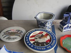 lot 45 image: Blue and white windmill- coca cola tray- eagle clock 12 diameter- crabby dicks wall art 10