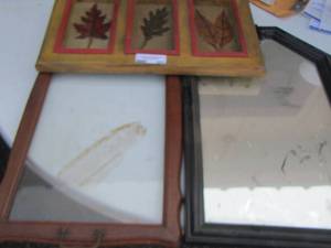 lot 201 image: metal leaf design wall hanger- clear glass double handled trey- black vanity mirror