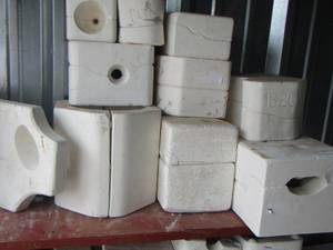 lot 33 image: large lot of ceramic molds- eggs- coffee mugs- long view symbol plus
