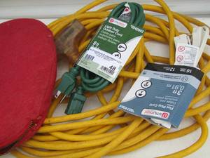 lot 48 image: rope in bag and various extension cords plugs