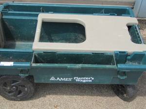 lot 49 image: Ames planters wagon for gardening  with handle pulls well