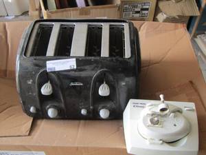 lot 62 image: sunbeam 4 slot black toaster- black and decker gizmo can opener