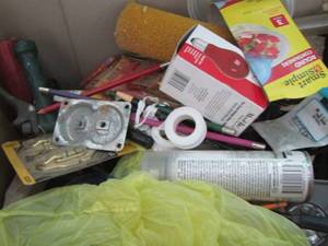 lot 101 image: Small tool caddy box with saws pliers and much more