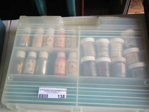 lot 138 image: case of glitter and some paints