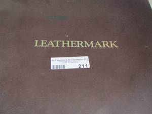 lot 211 image: Leathermark photo album NIB with picture dividers