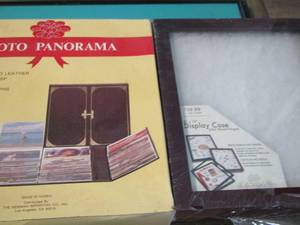 lot 16 image: Photo panorama holds up to 200 pictures--- 810 photo display case new