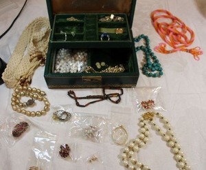 lot 29 image: MCM jewelry box with assorted fashion jewelry selection.