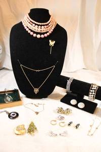 lot 19 image: Signed jewelry selection. Includes Hallmark, ART, JJ, Monet, Avon, Marvella, plus