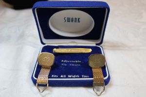 lot 111 image: RARE Swank brand 50th Anniversary gold finish cufflinks in case