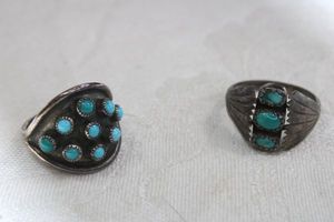 lot 93 image: (2) Sterling Silver Turquoise rings. Unmarked. Sizes 6 and 8.