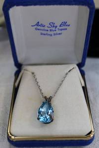 lot 86 image: Sterling Silver Artic Sky Blue Topaz pendant on sterling silver 18L necklace in box. Marked 925.