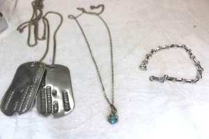 lot 87 image: Sterling necklaces and bracelet. All marked 925 or sterling. Dog tags not sterling.