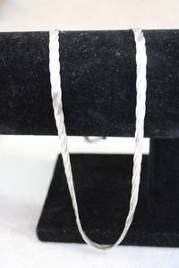 lot 61 image: Sterling Silver Italian flex herringbone necklace. Marked 925 Italy. Lobster clasp. 18L