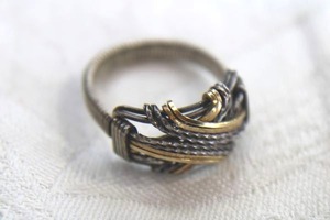 lot 68 image: Sterling mixed metal wire wrapped ring. Unmarked. Size 10