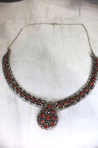 lot 52 image: Sterling Silver and Carnelian tear drop necklace with paper clip link yoke. Marked F.A. Sterling on reverse. 20L