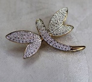 lot 53 image: Sterling Silver marcasite dragonfly pin w gold vermeil tail. Marked 925. 1.5W x 1.25H