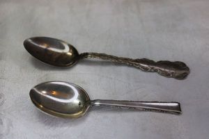 lot 59 image: (2) Sterling Silver spoons. Both marked sterling. Mervod & Jacquard & Lunt brands.