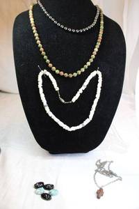 lot 47 image: Hematite necklace 18L, Shell necklace 18, Agate bead necklace 26L, rock cross necklace plus
