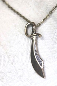 lot 76 image: Sterling Silver sword pendant (marked 925) on 18L necklace.