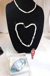 lot 31 image: Freshwater pearl Quartz and Rose Quartz necklace 16L, Glass elongated bead, Hematite and pink coral necklace. 19L, Alpaca cuff bracelet and Canadian MOP and Paua shell lacquer barrette.