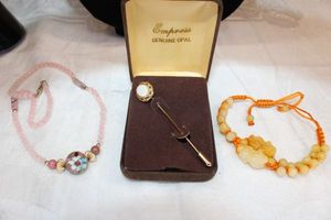 lot 39 image: Gemstone jewelry. Rose Quartz necklace with cloisonne bead, Opal stick pin in box, carved Jade foo dog and bead bracelet
