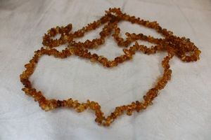 lot 34 image: Continuous Citrine gemstone chip bead necklace from The Rainbow Bridge store (Fort Worth). 32L