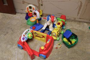 lot 163 image: Toddler toys with car and rocking horse
