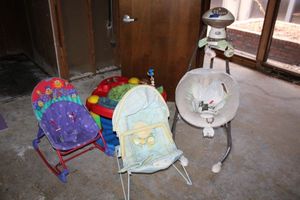 lot 169 image: Baby rocker seats, baby swing and bouncy saucer