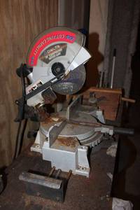 lot 5 image: Delta 10 Compound Miter Saw and table