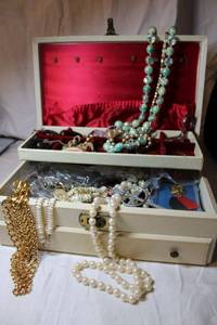 lot 28 image: MCM jewelry box with assorted fashion jewelry selection.