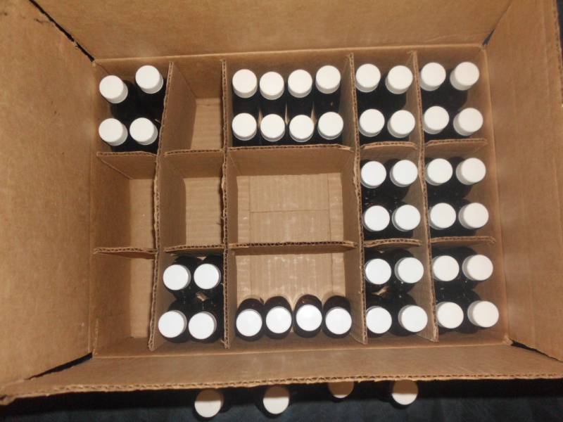 lot 151 image: AMBER CLEAR MEDICINE BOTTLES